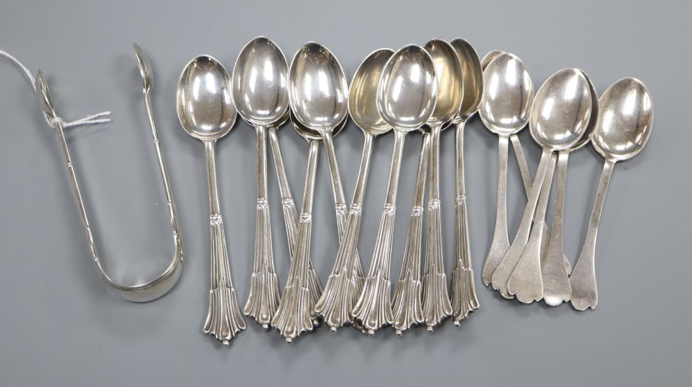 A set of 10 silver teaspoons and a pair of sugar tongs, London 1883, Frances Higgins III a set of of 6 silver coffee spoons, 8oz.